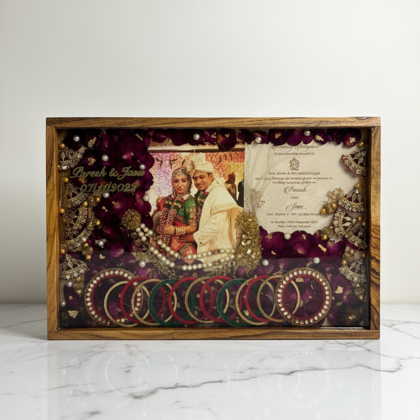 Resin photo frame displaying preserved wedding flowers and keepsakes in a clear handcrafted design.